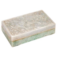 A late 19th/ early 20th century carved white jade box and cover