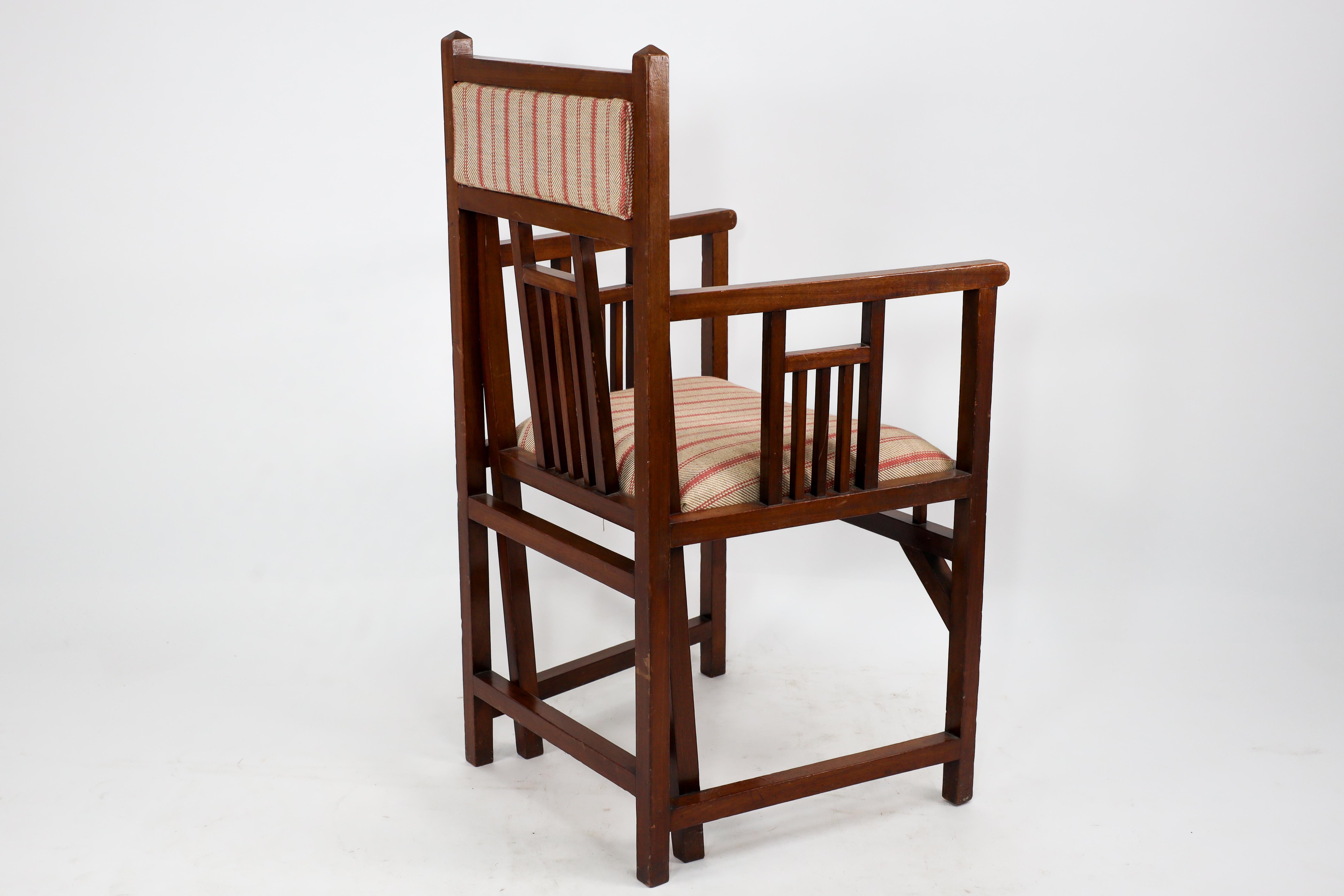 Bombay Art Furniture An Anglo-Japanese Walnut armchair with a double back leg. For Sale 1
