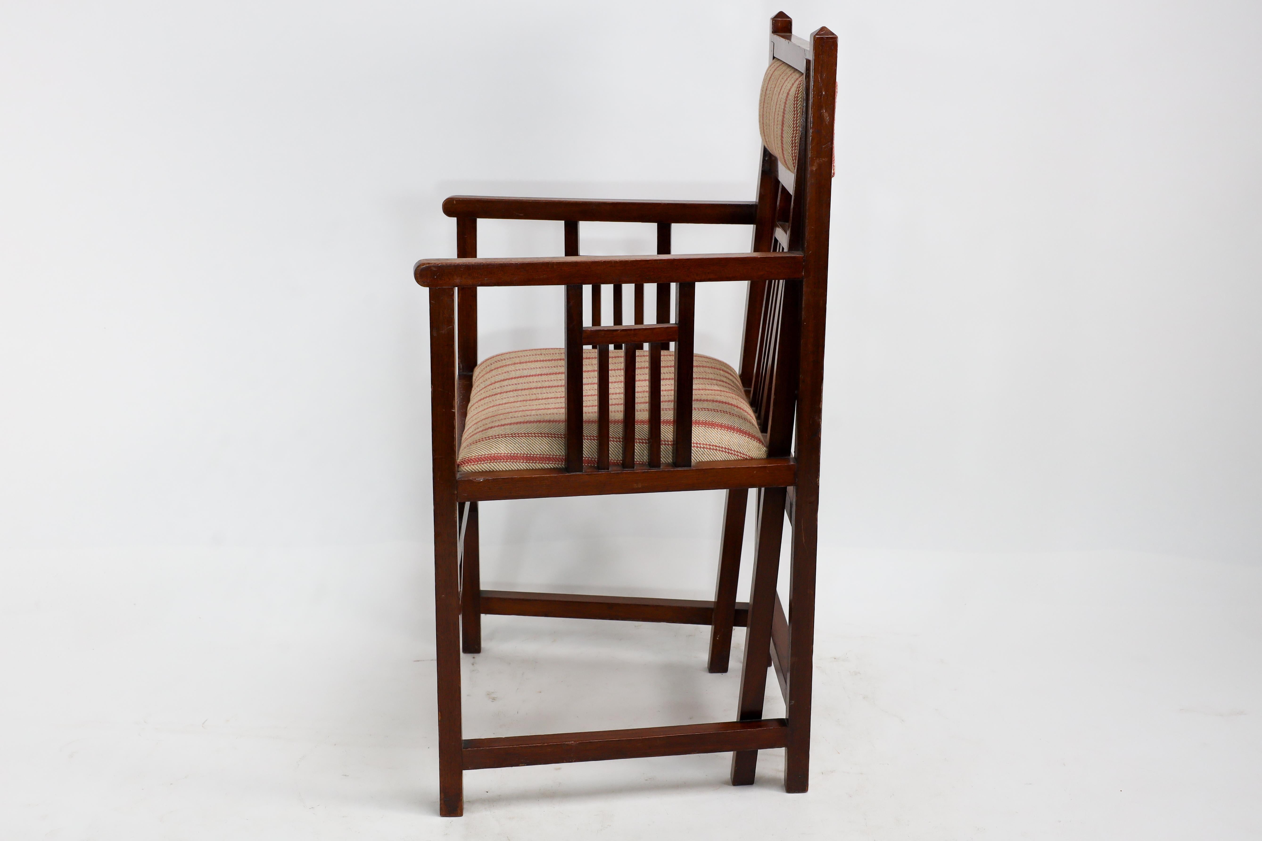 Bombay Art Furniture An Anglo-Japanese Walnut armchair with a double back leg. In Good Condition For Sale In London, GB