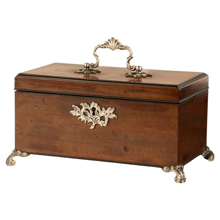 A late George III mahogany tea caddy For Sale