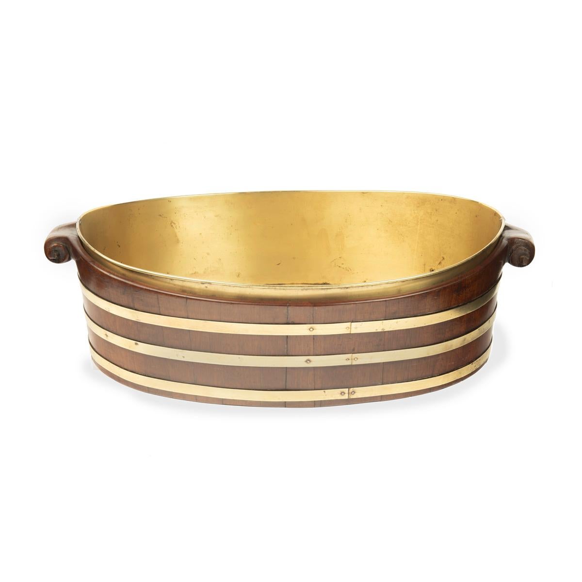 English A late Georgian brass bound mahogany oyster bucket For Sale