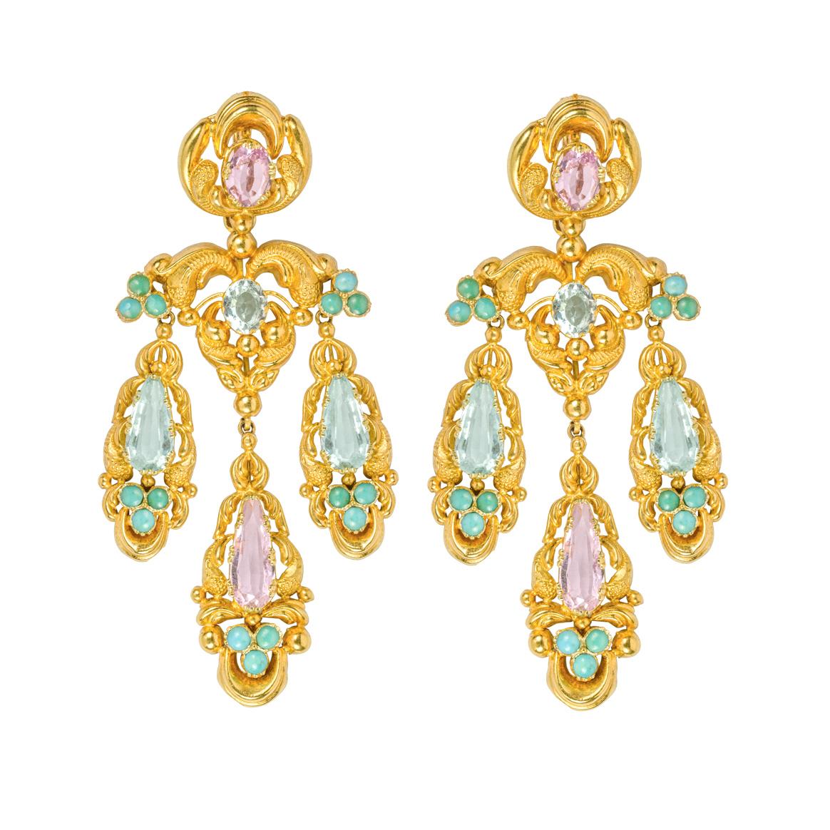 A late Georgian gold aquamarine, pink topaz and turquoise suite, consisting of a necklace, a pair of drop earrings and a bodice brooch, the necklace with ten lozenge shaped links each centrally set with a pink topaz surrounded by four oval