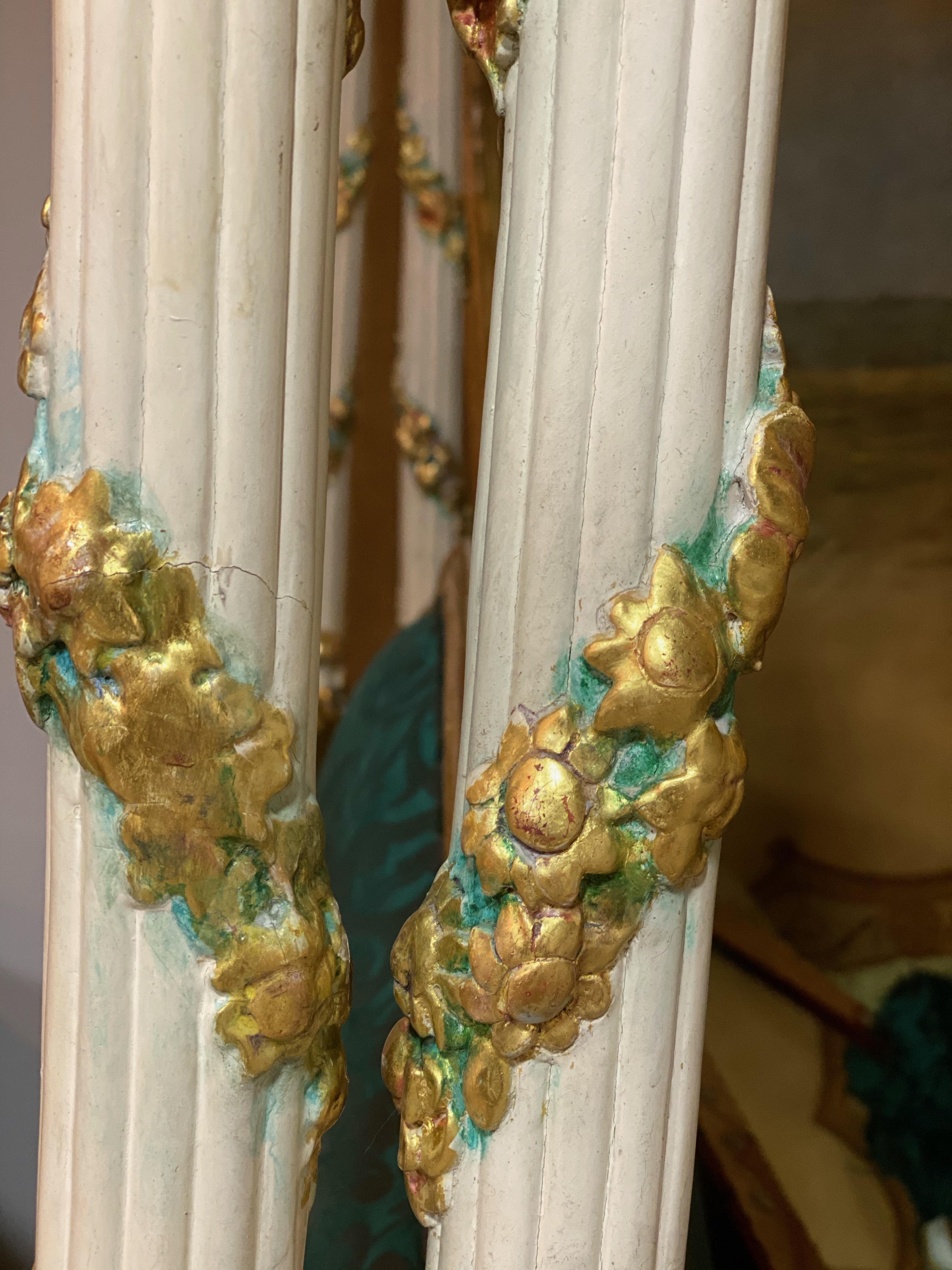 A late Louis XV white-painted, parcel-gilt and polychrome decorated lit a la polonaise, circa 1765.