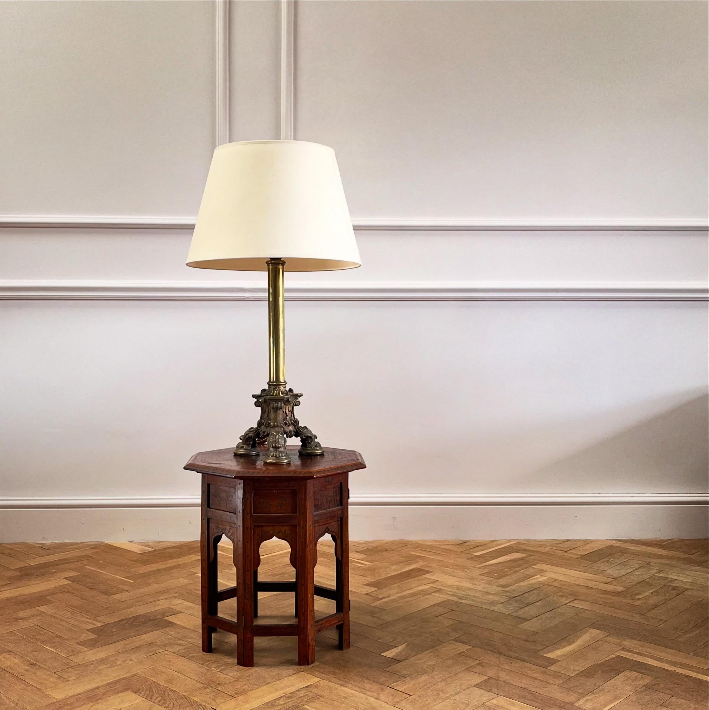 A padouk and brass inlaid octagonal occasional table, the top profusely decorated with foliage motifs, the legs imitating architectural designs - warm nutty colour throughout. 

Anglo-Indian, C.1900

H 46 x W 46 cms

