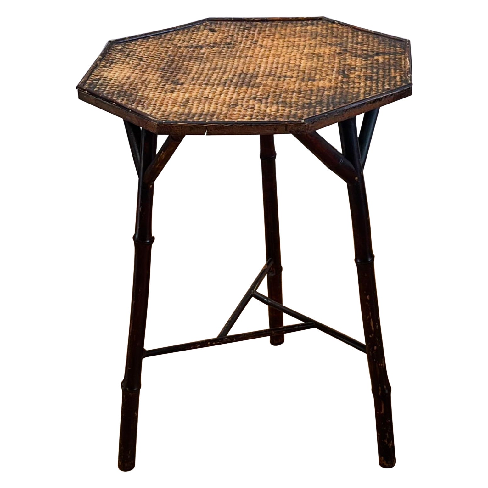 A late nineteenth century bamboo table with tripod legs