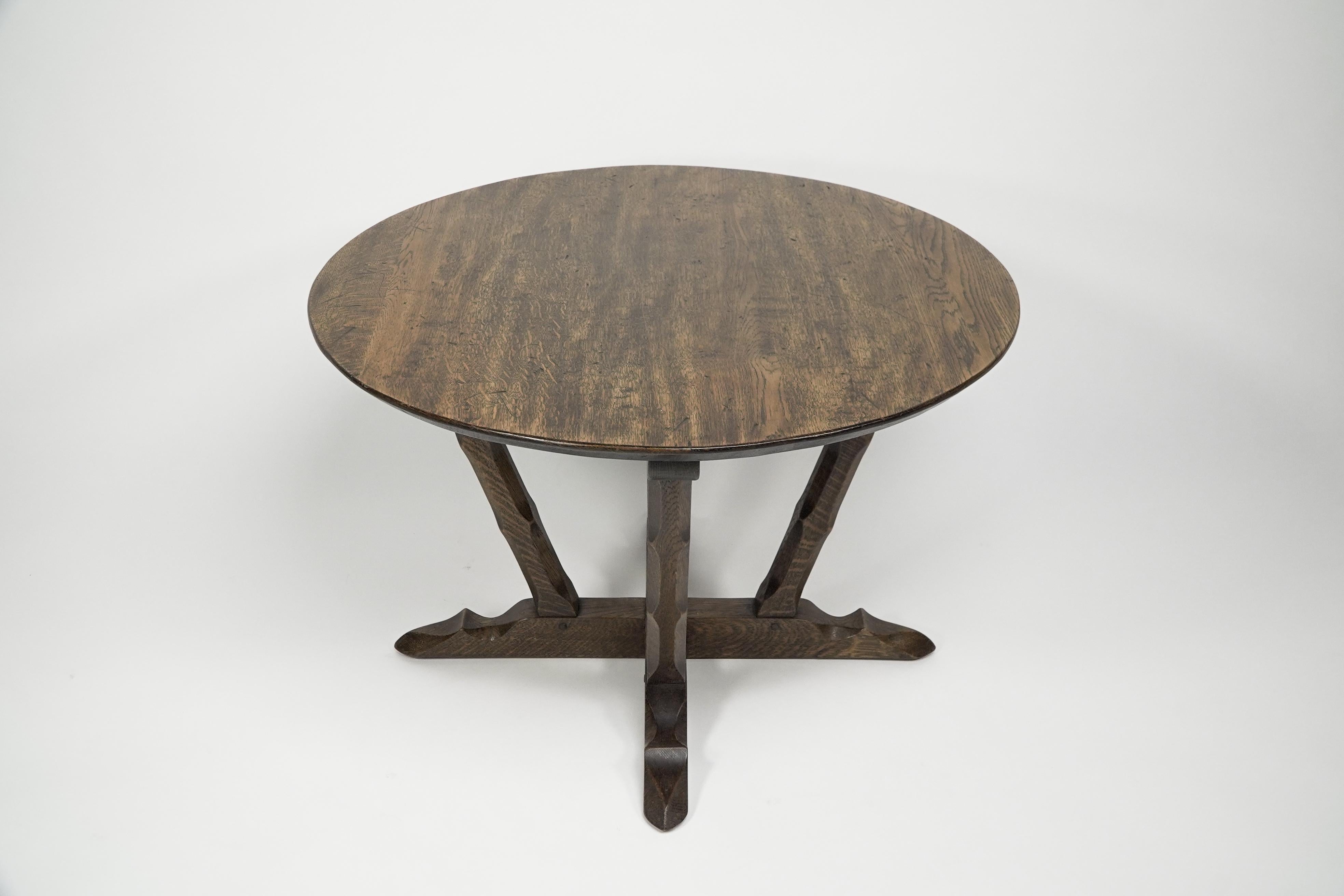 Arts and Crafts Rupert Griffith Circular oak coffee table with deep sculptured chamfered details