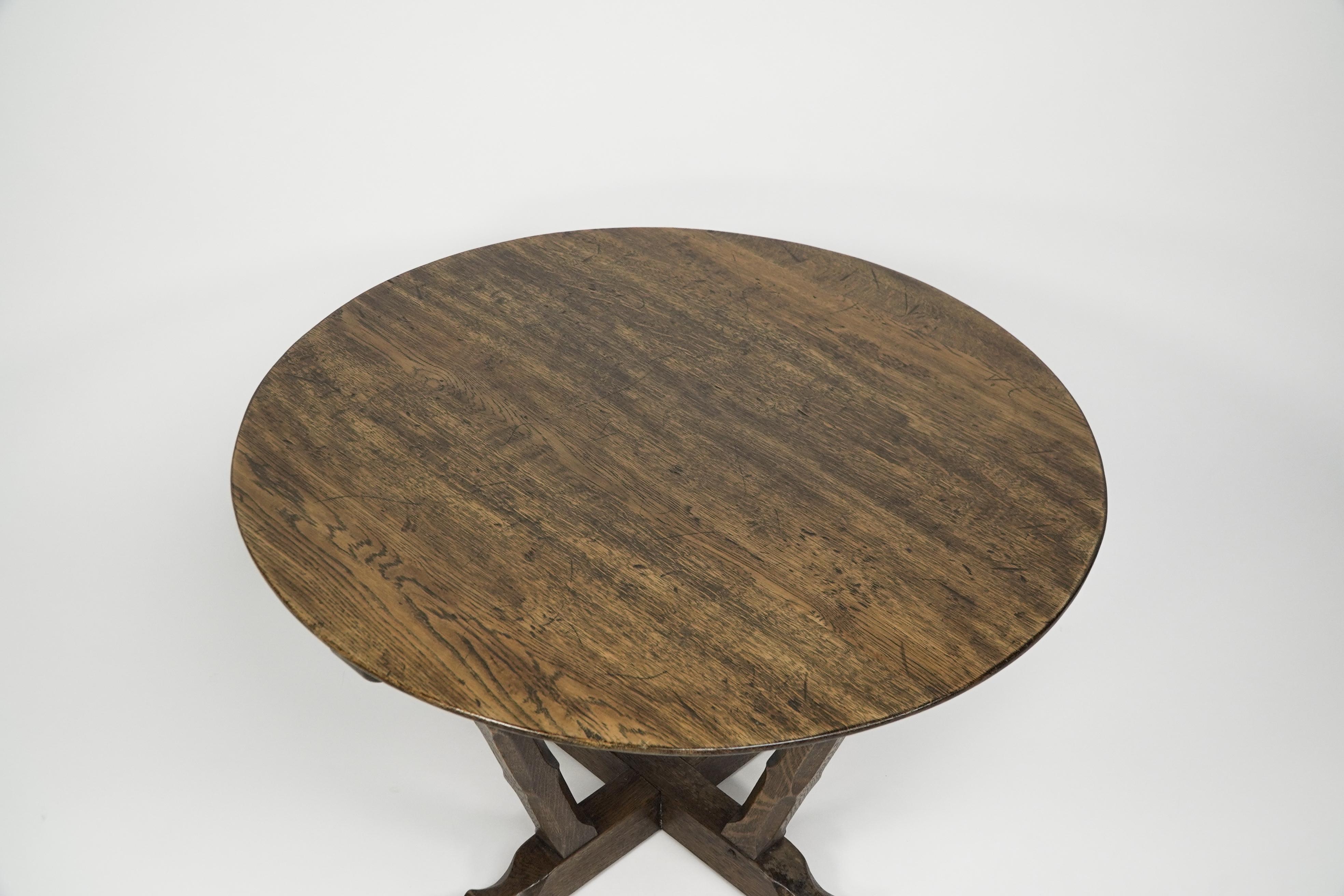 Mid-20th Century Rupert Griffith Circular oak coffee table with deep sculptured chamfered details