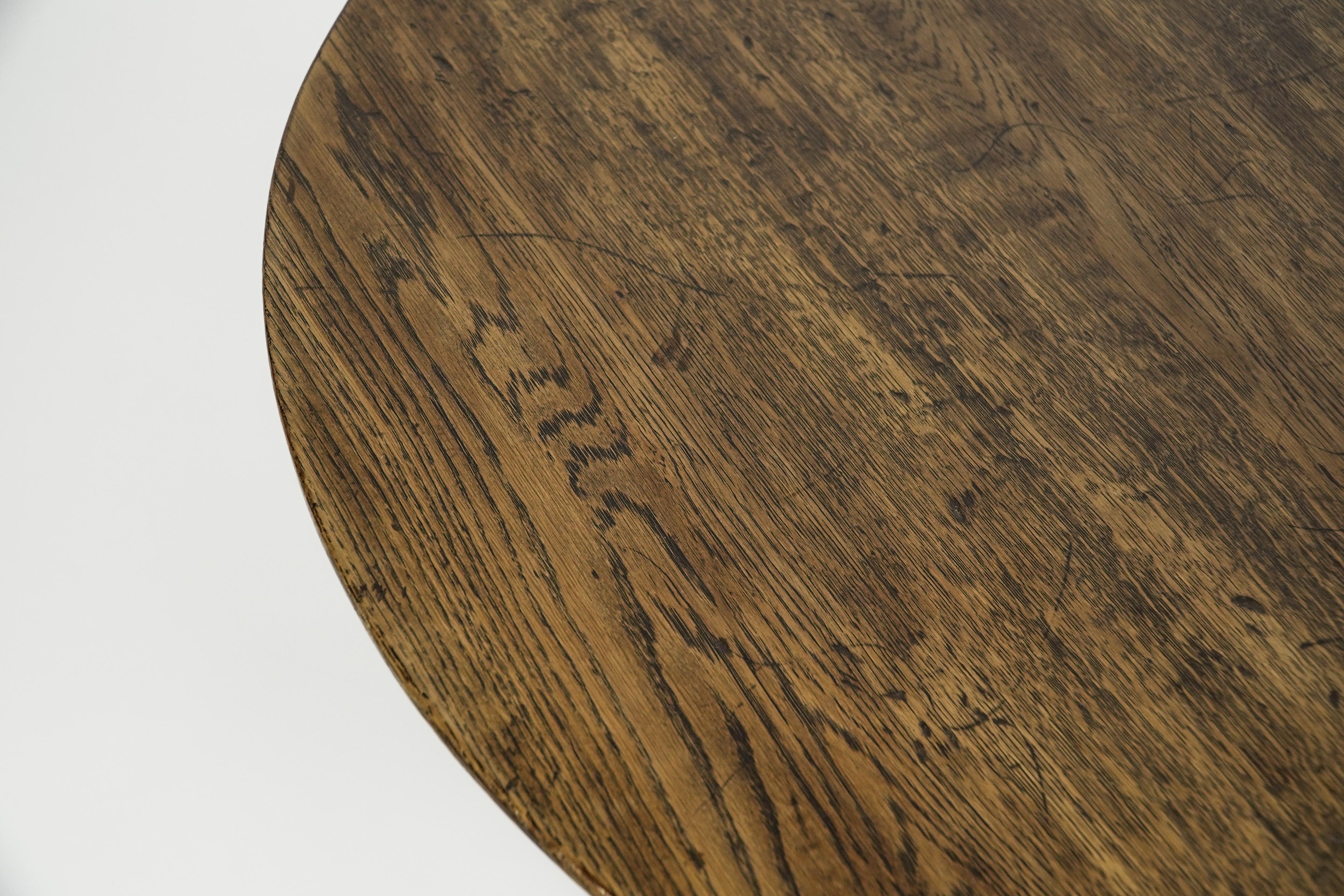 Rupert Griffith Circular oak coffee table with deep sculptured chamfered details 1