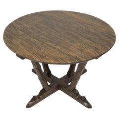Rupert Griffith Circular oak coffee table with deep sculptured chamfered details