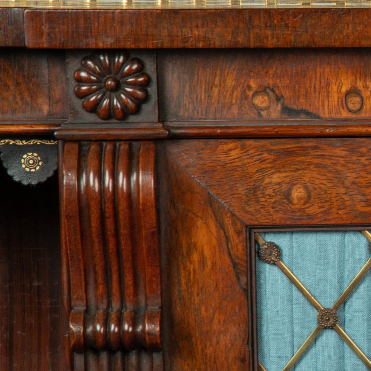 English A late Regency rosewood breakfront side cabinet attributed to Gillows