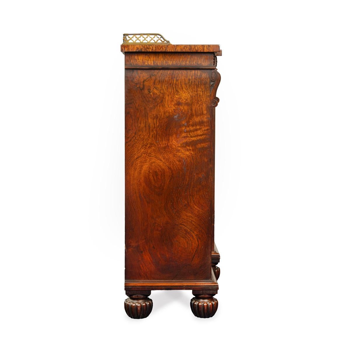 19th Century A late Regency rosewood breakfront side cabinet attributed to Gillows