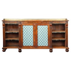 A late Regency rosewood breakfront side cabinet attributed to Gillows