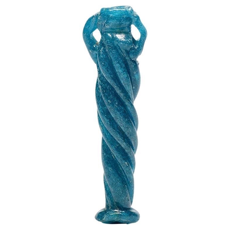 A Late Roman turquoise glass rod-formed balsamarium For Sale