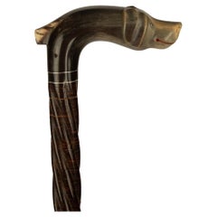 A late Victorian cane with a smiling dog’s head top