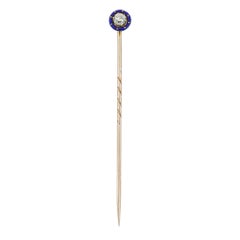 A late Victorian diamond and blue enamel stick pin