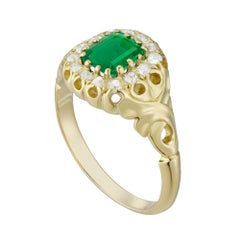 A Late Victorian Emerald And Diamond Cluster Ring