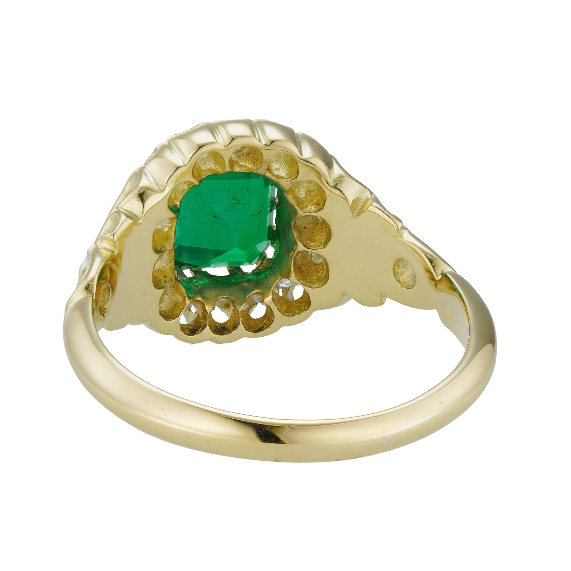 Women's or Men's A Late Victorian Emerald And Diamond Cluster Ring For Sale