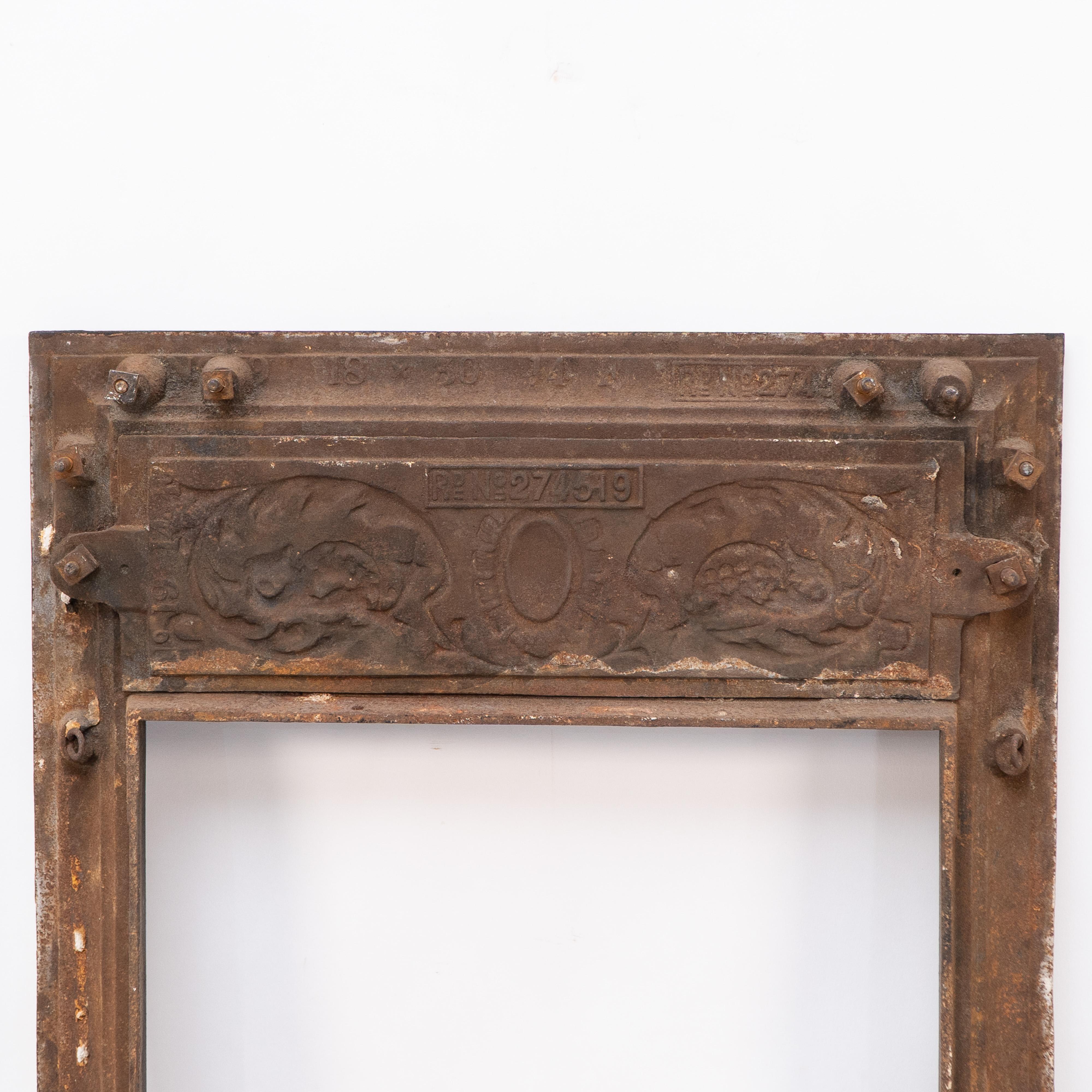 A late Victorian fireplace with stylized floral details to the top For Sale 5