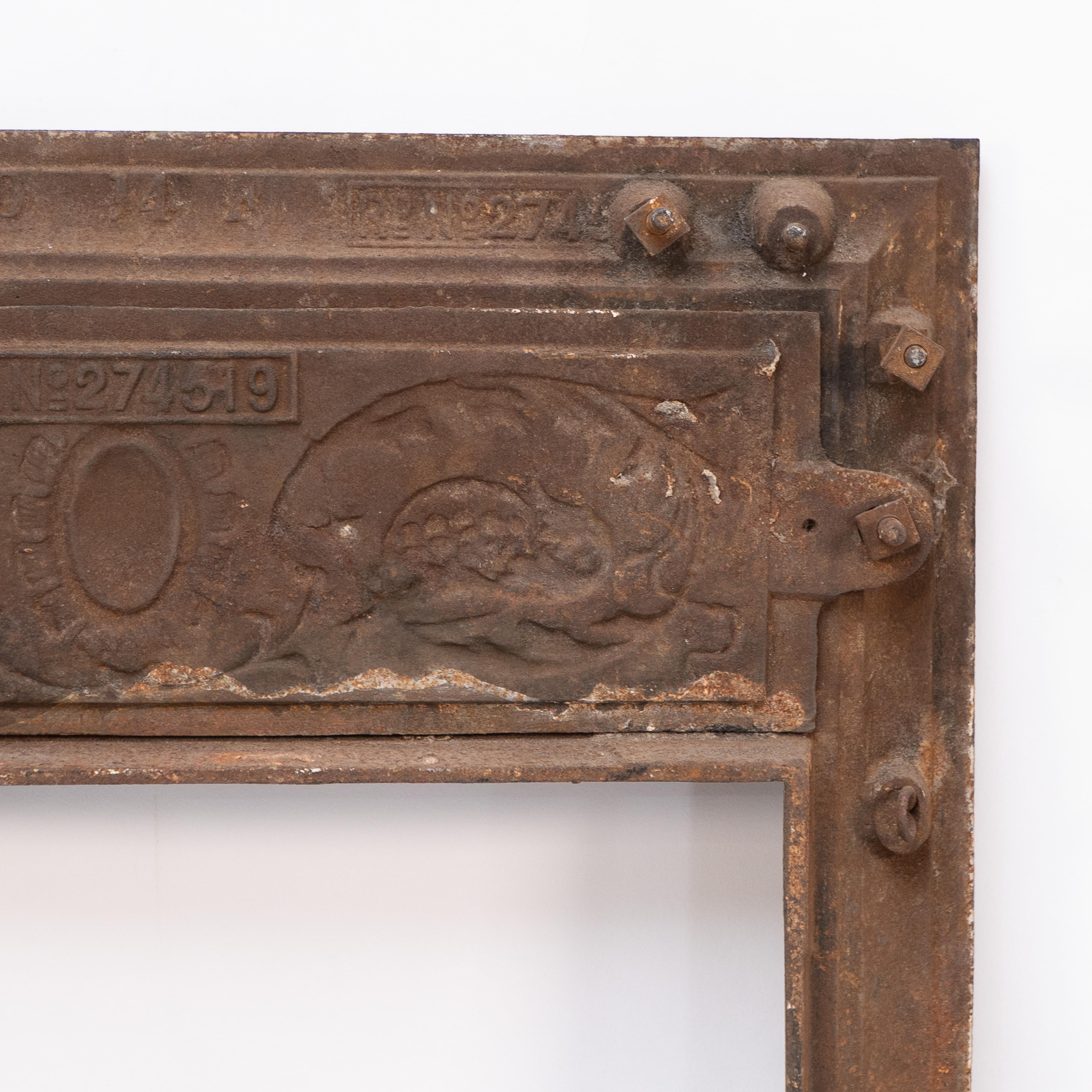 A late Victorian fireplace with stylized floral details to the top For Sale 8
