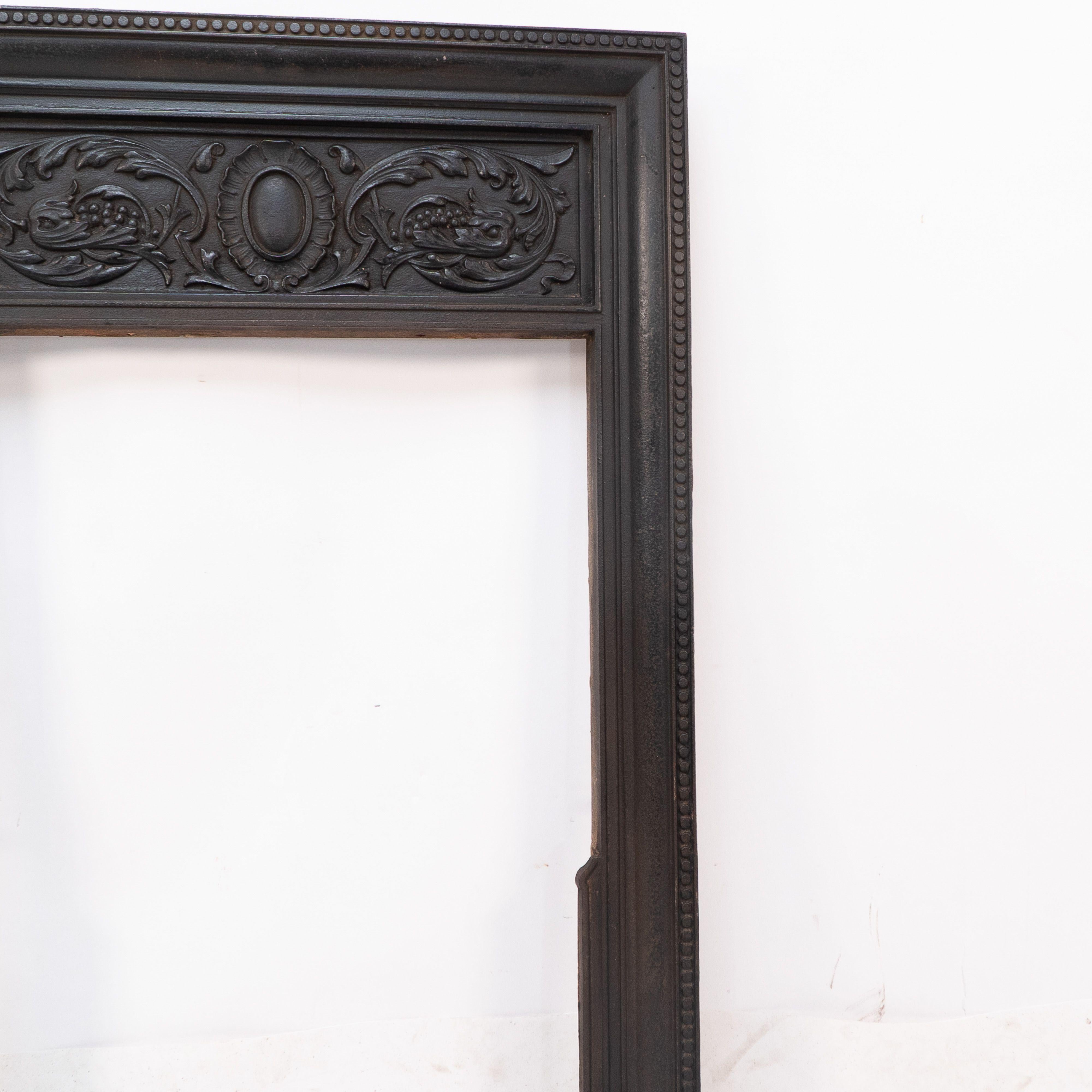 A late Victorian fireplace with stylized floral details to the top For Sale 2