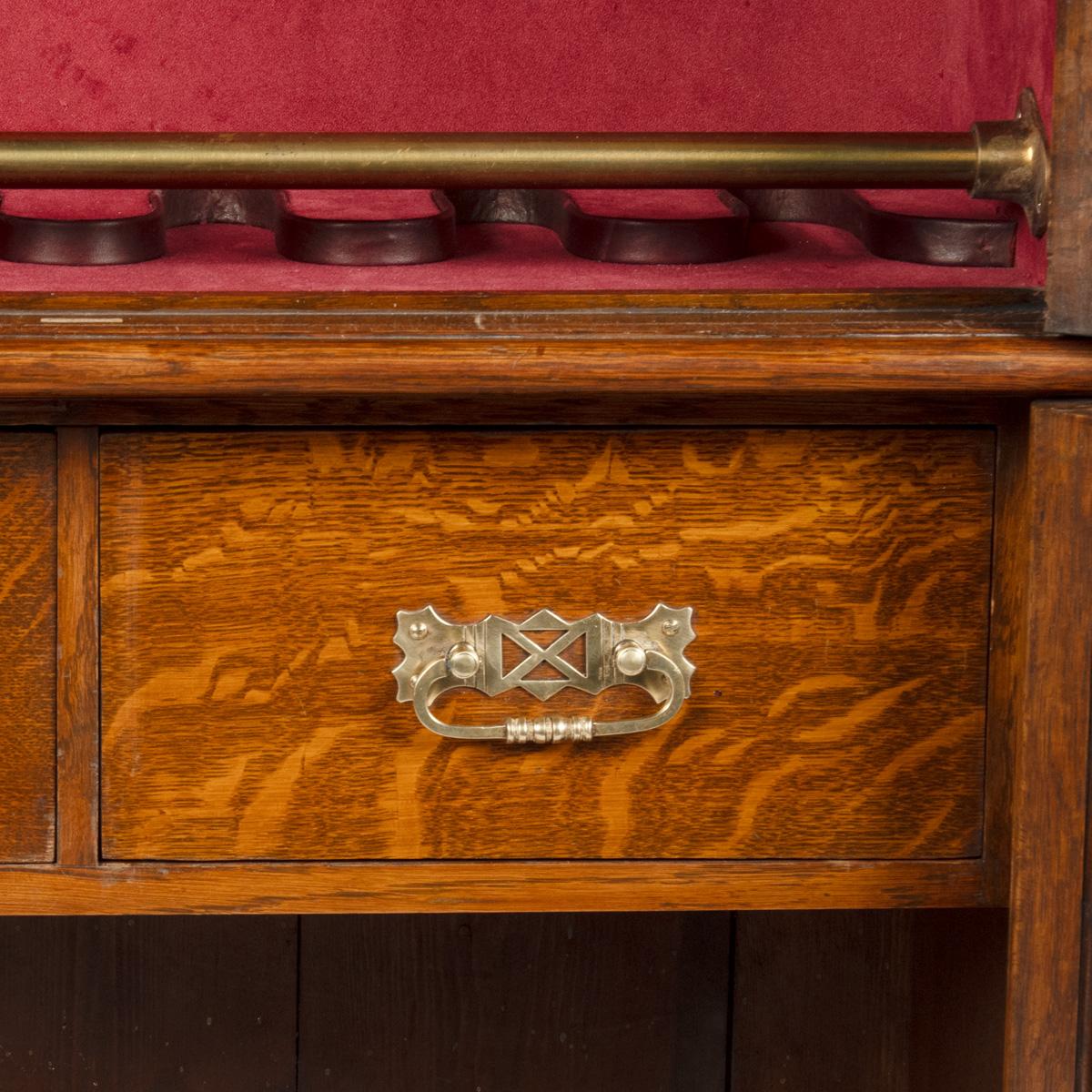 A late Victorian oak gun cabinet 7