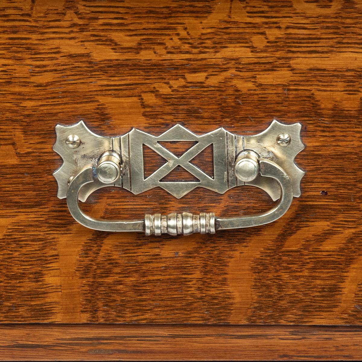 English A late Victorian oak gun cabinet