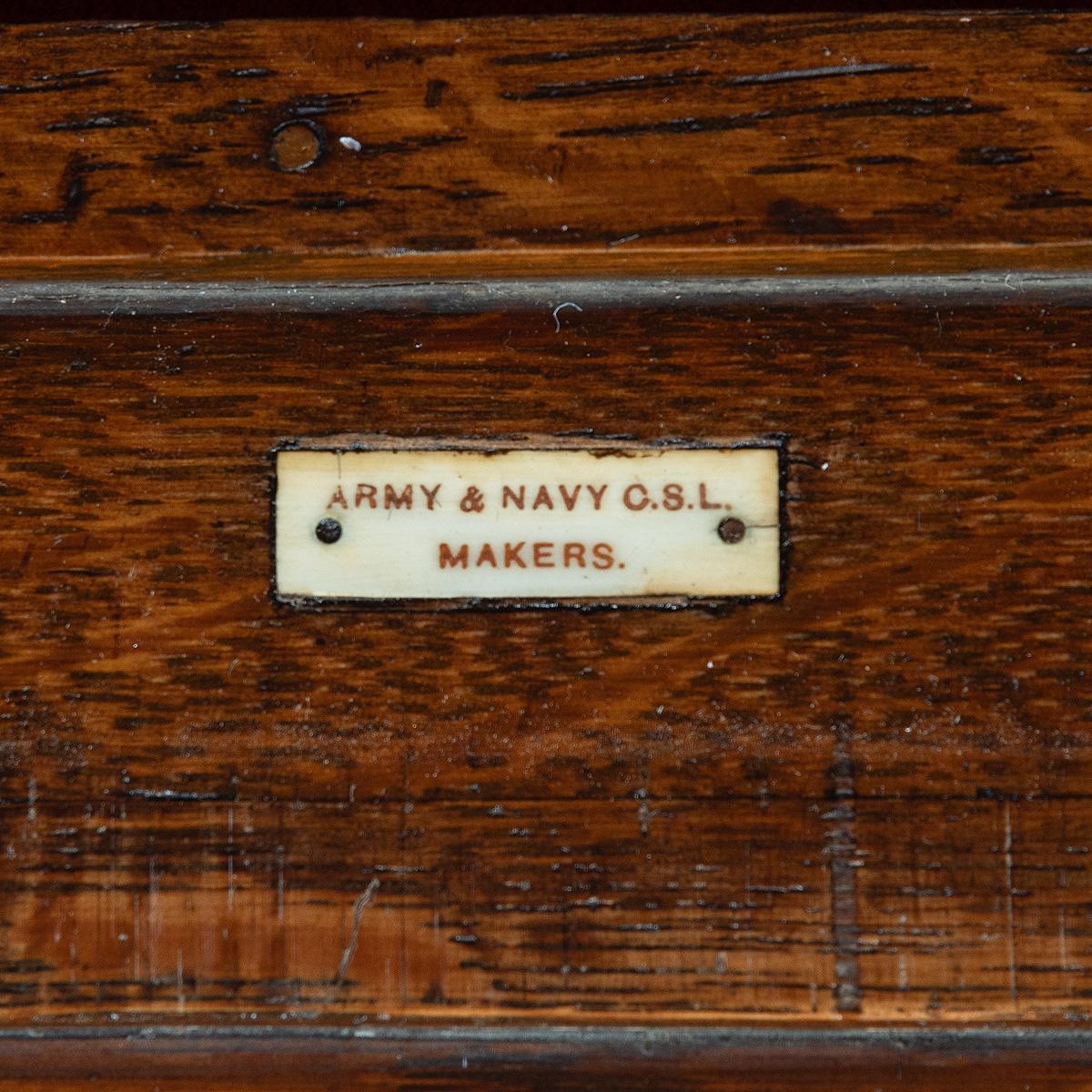 Oak A late Victorian oak gun cabinet
