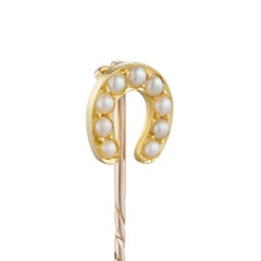 A Late Victorian pearl-set horse-shoe stickpin