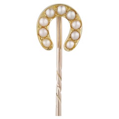 A Late Victorian pearl-set horse-shoe stickpin