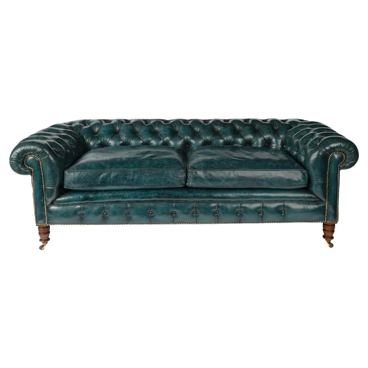 A late Victorian two-seater Chesterfield sofa For Sale