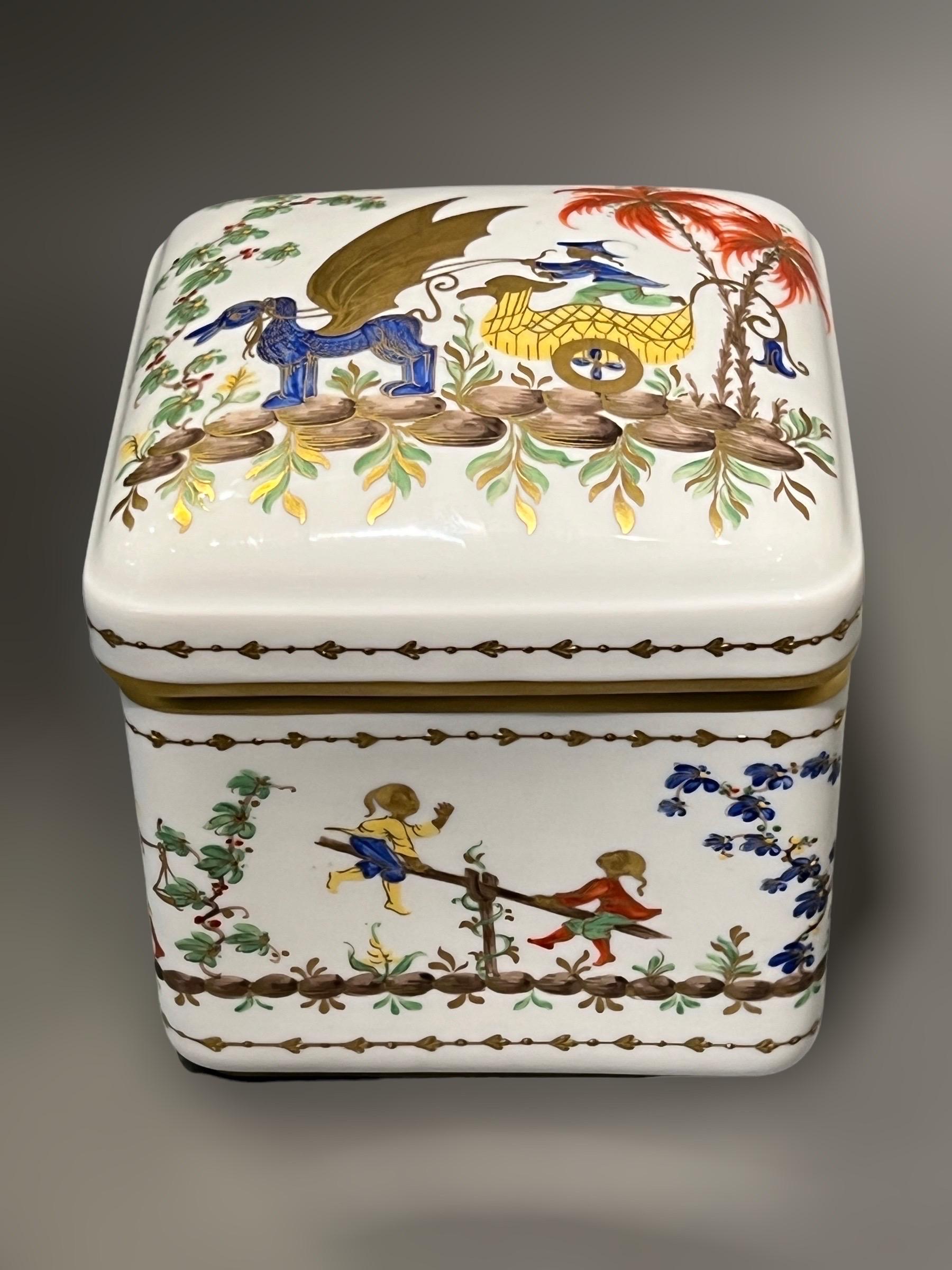 A porcelain box made by Le Tallec in the Cirque Chinois Pattern (Chinese circus).
The Cirque Chinois Pattern was originally created by Camille Le Tallec for Tiffany & Co
As the pattern is discontinued, perfect condition pieces as this one are rare