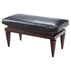 A leather covered mahogany bench with alligator design,  manner of Andre Arbus