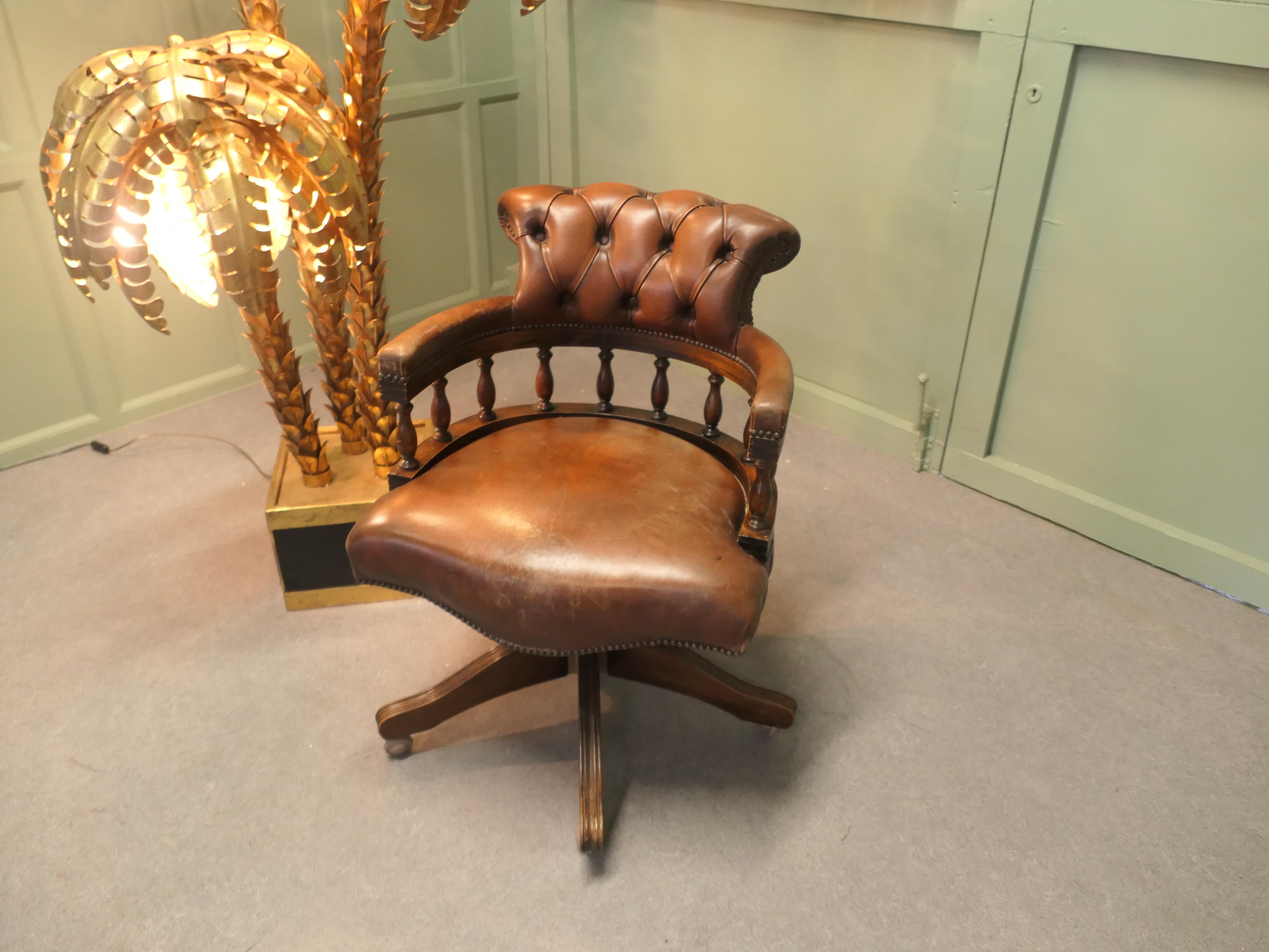A Leather Hide Swivelling Desk Chair or Captains Chair For Sale 1