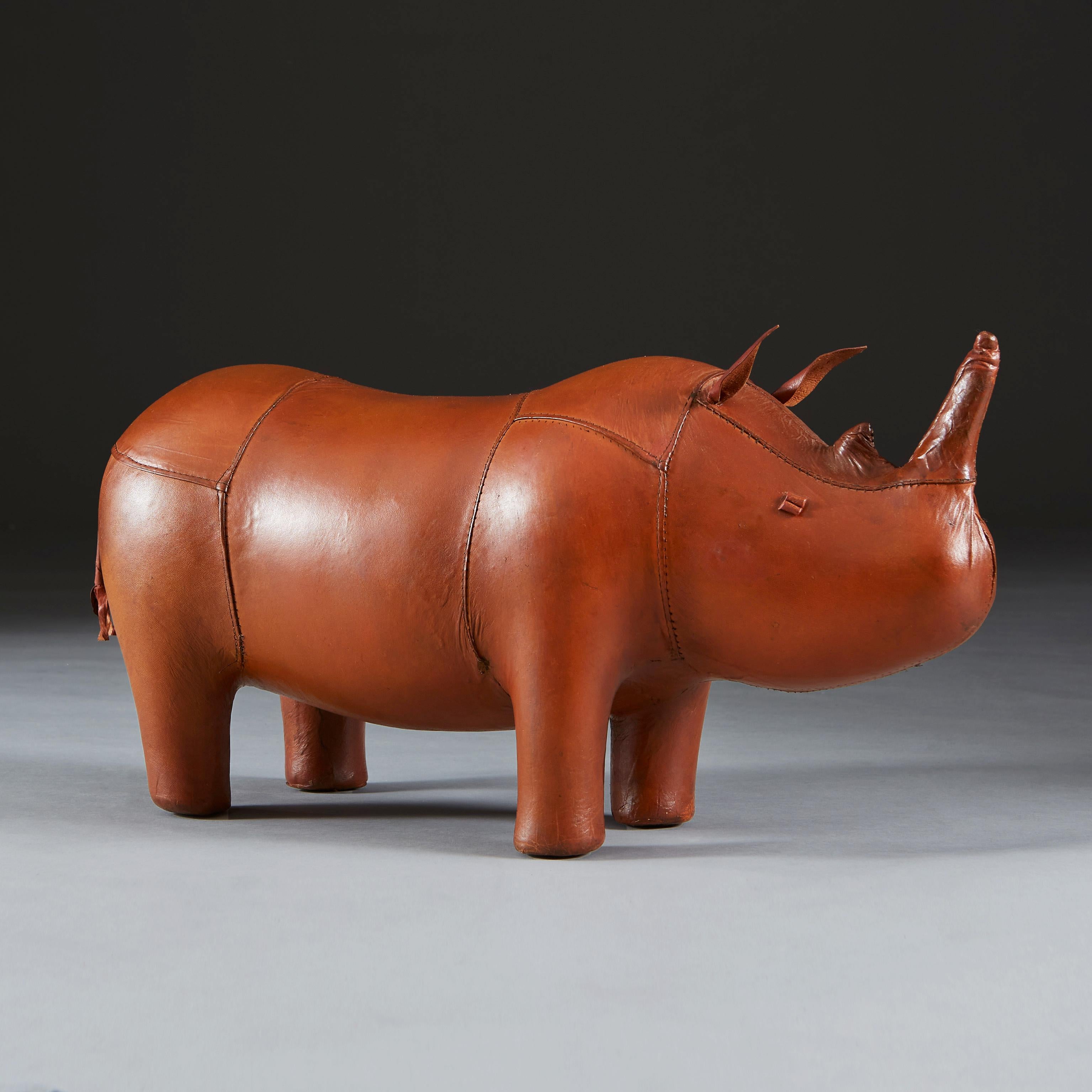 A leather rhinoceros foot stool with stitched leather panels and button eyes, by Dmitri Omersa for Liberty, London.