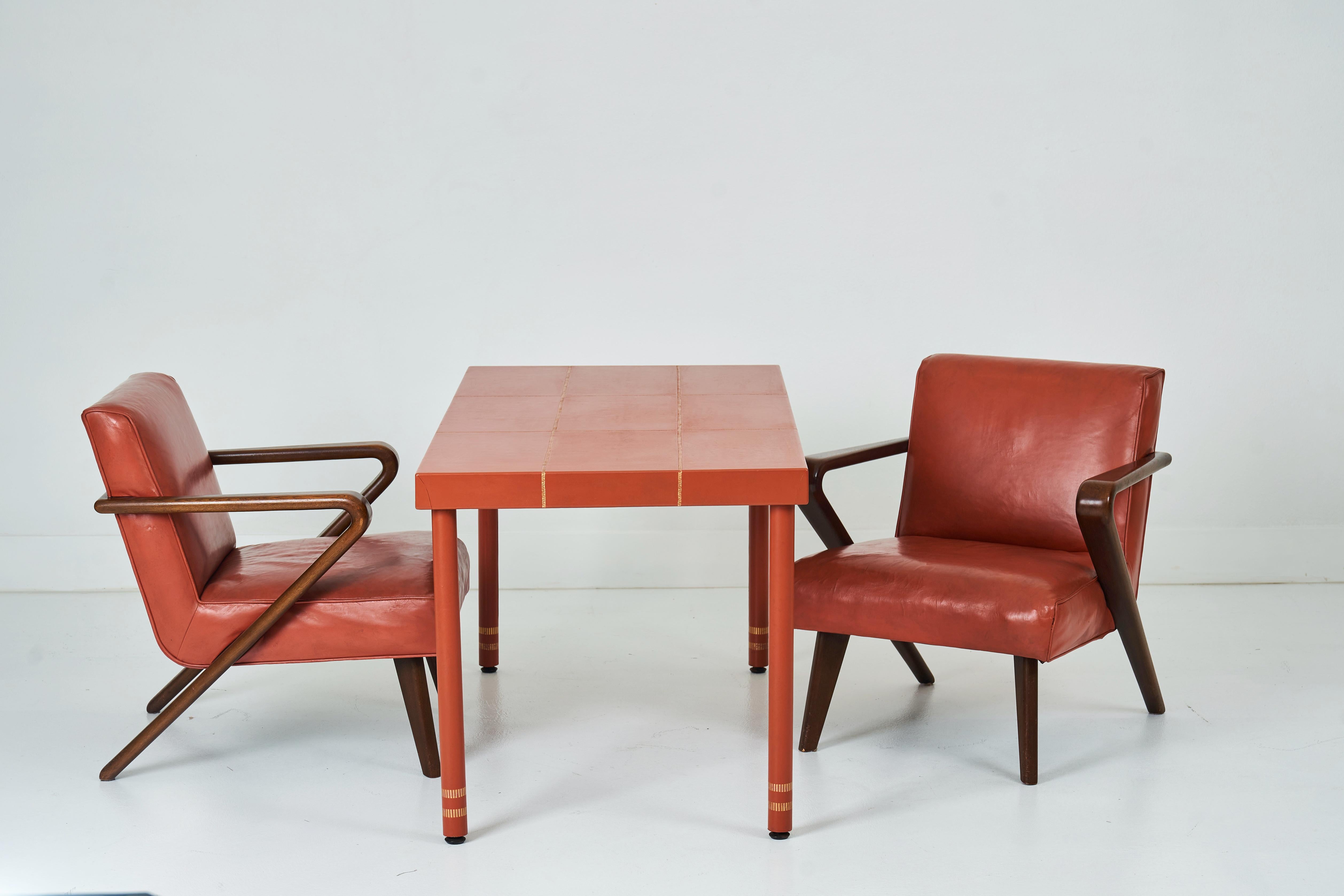 A Leather Wrapped Desk and Matching Arm Chairs designed by William Haines 2