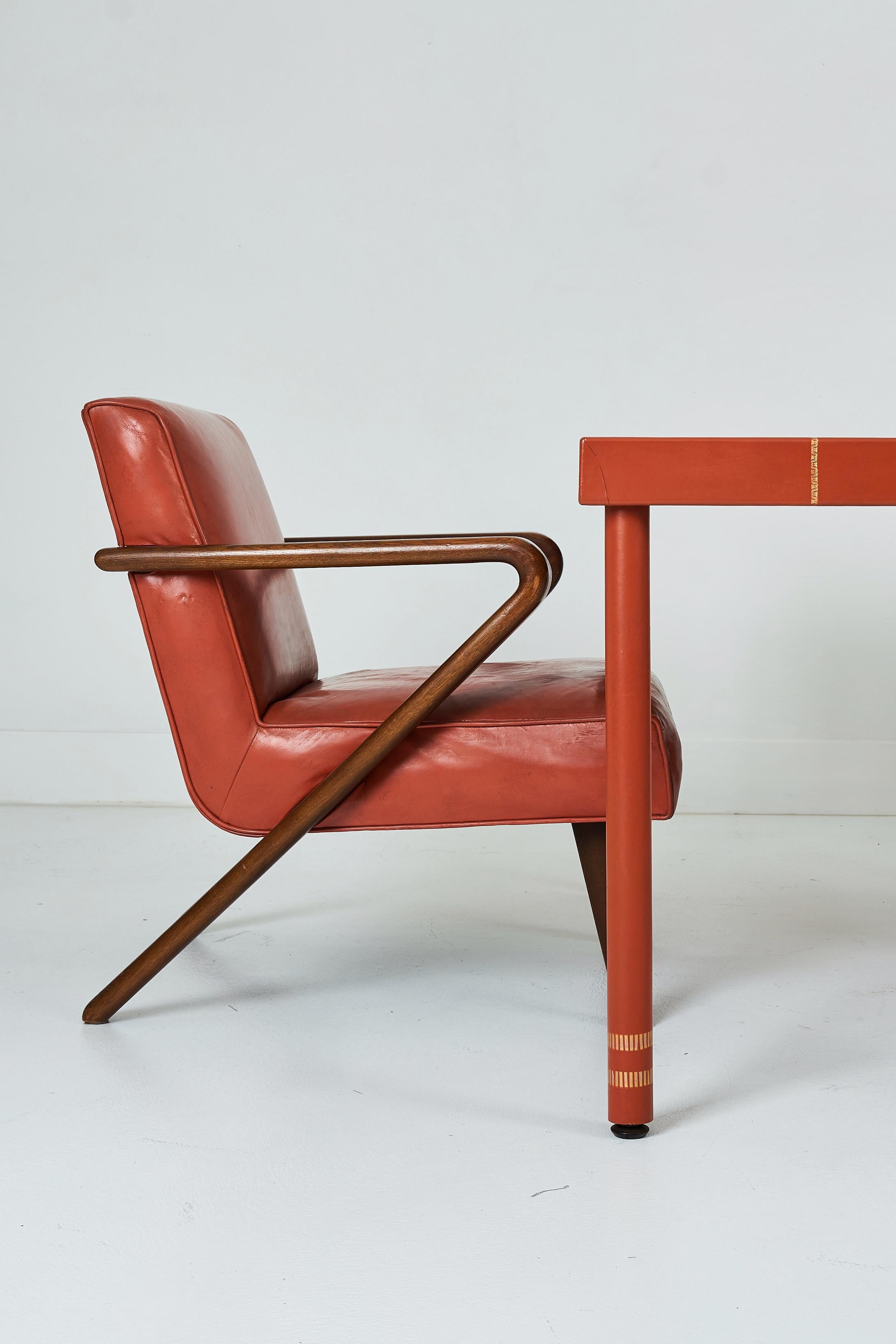 Mid-20th Century A Leather Wrapped Desk and Matching Arm Chairs designed by William Haines