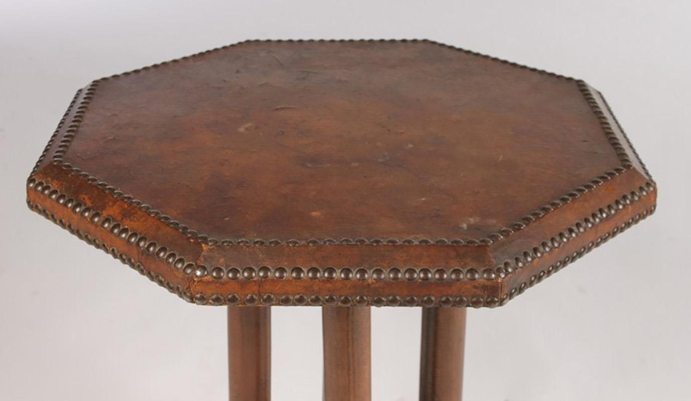 A French leather wrapped side table.
