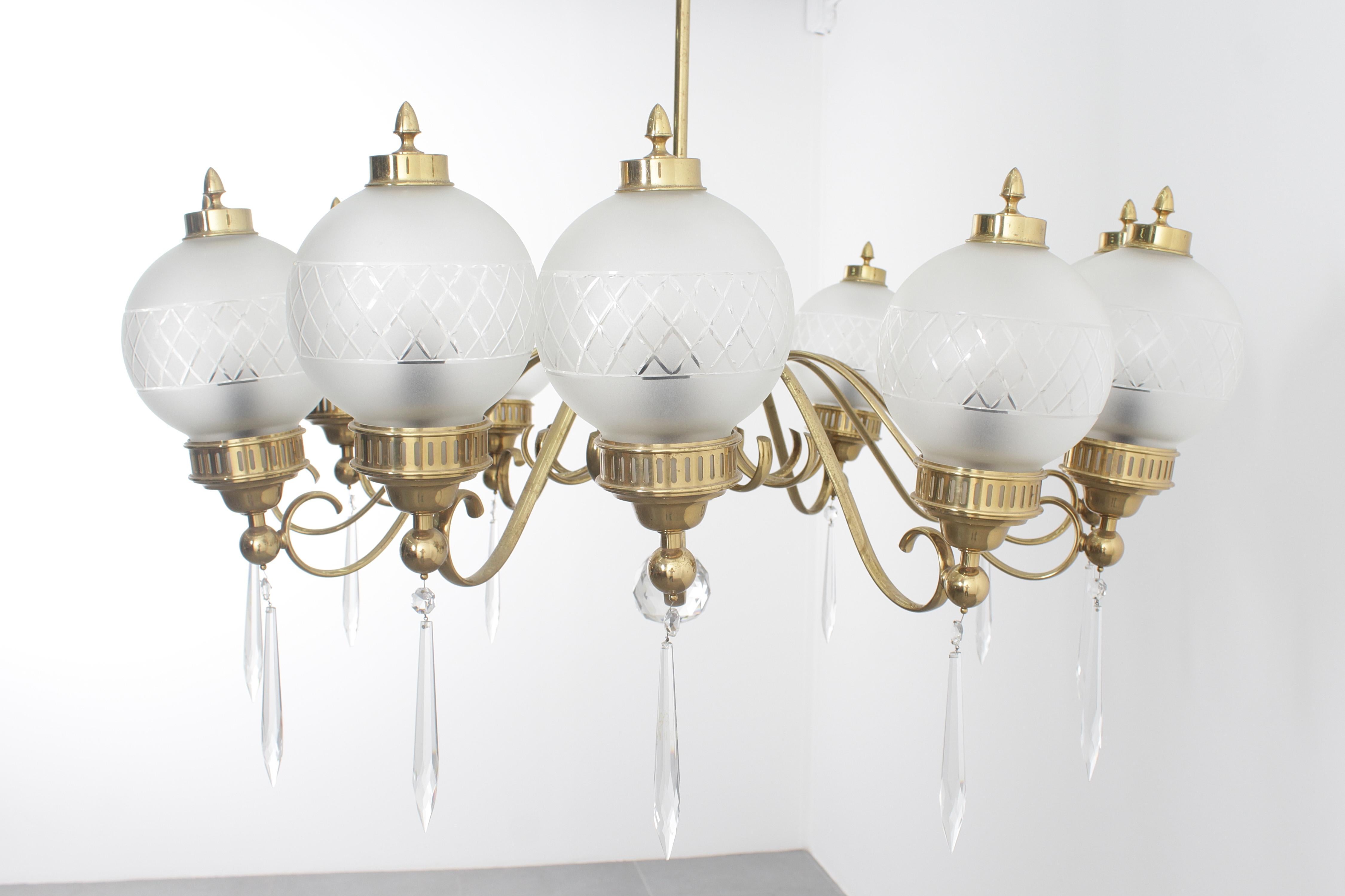A. Lelii per Arteluce Imponente lampadario a 10 bracci in ottone e vetro 1950 Italia in vendita 1