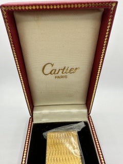 A Les Must De Cartier Paris 18k gold plated lighter