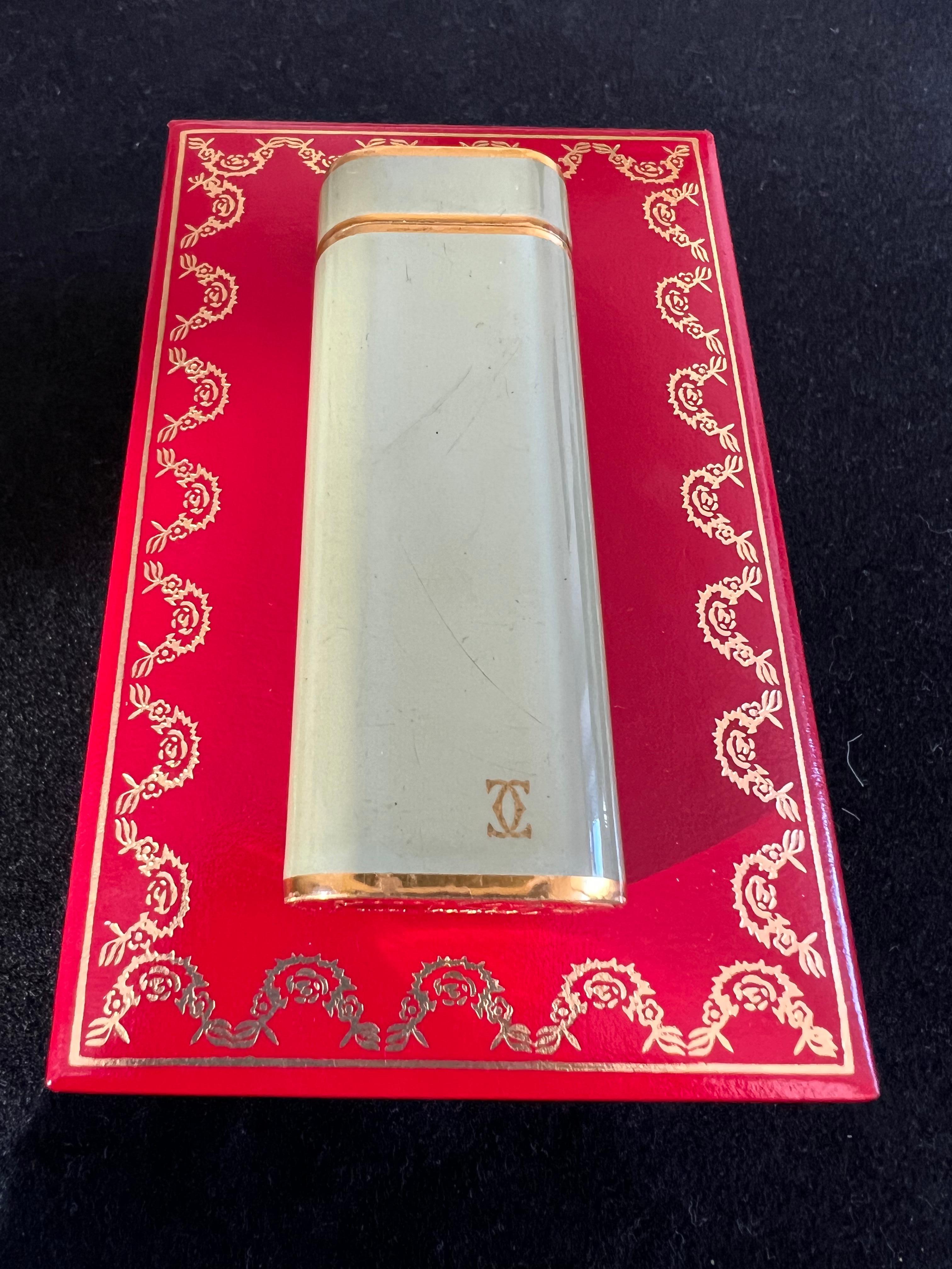 A Les Must De Cartier Paris 18k gold plated and Olive Chinese lacquer lighter 5