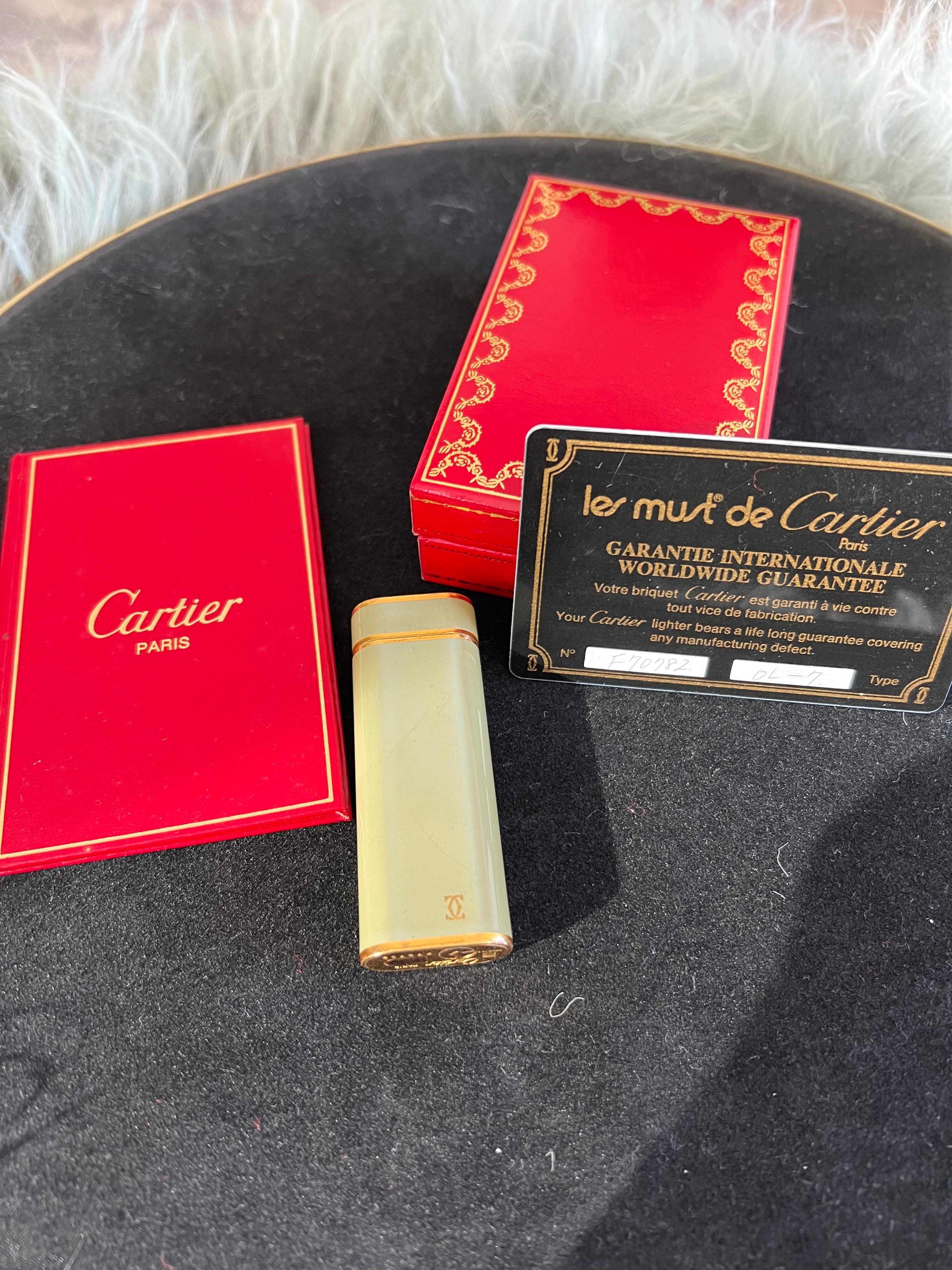 A Les Must De Cartier Paris 18k gold plated and Olive Chinese lacquer lighter 4