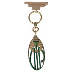 A Liberty Enamel Diamond Gold Jacket Brooch