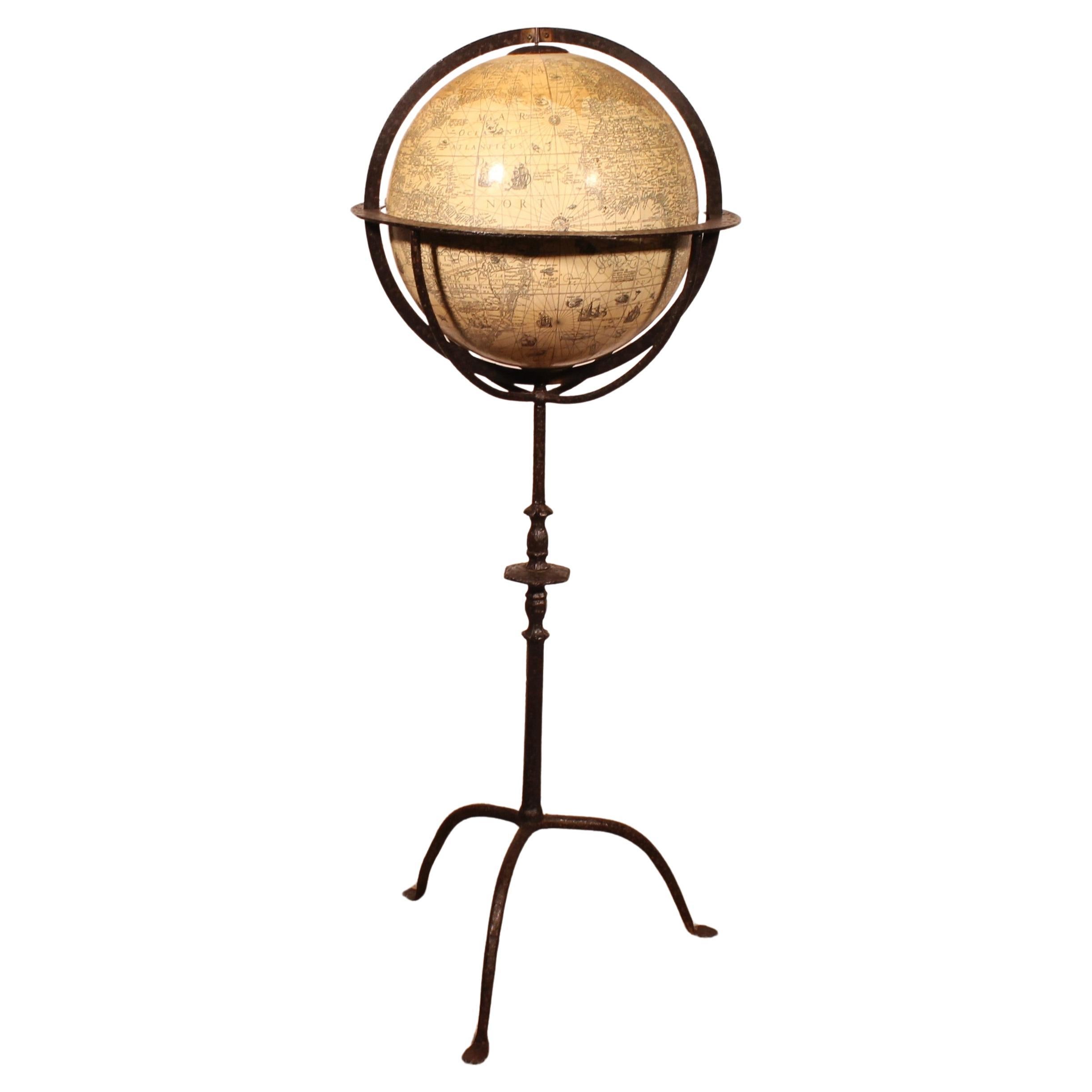 A Library Terrestrial Globe With Wrought Iron Base For Sale