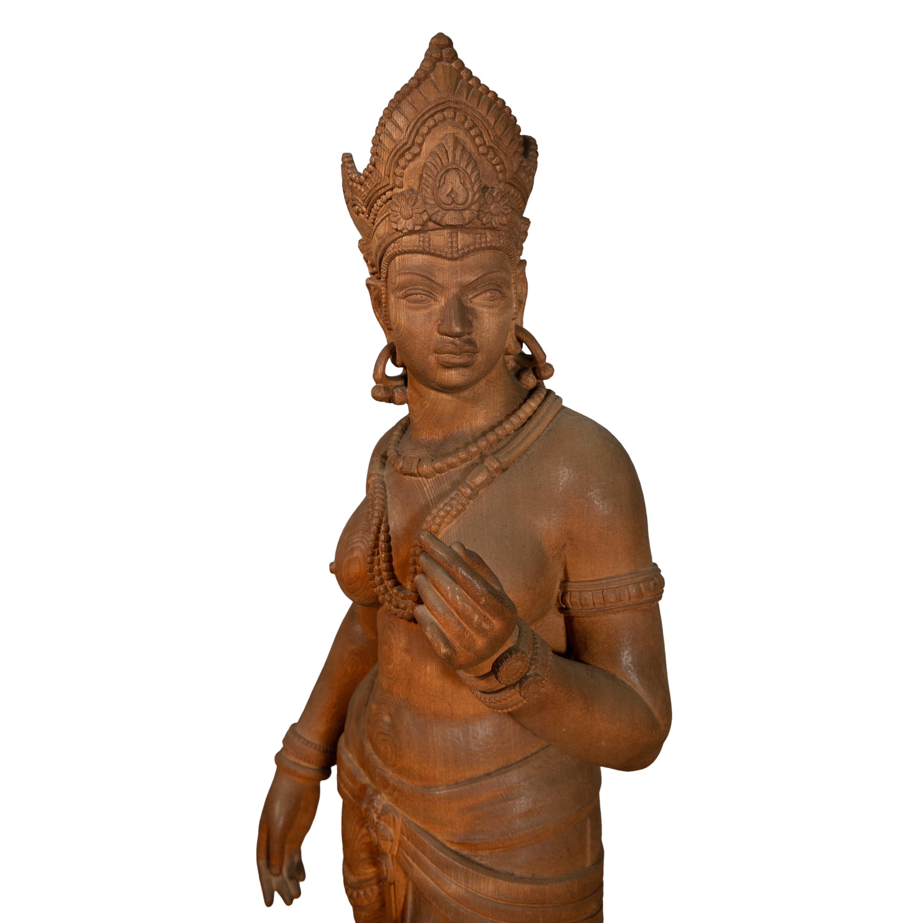 Hand-Carved A life-size carved wood sculpture of the Hindu goddess Parvati For Sale