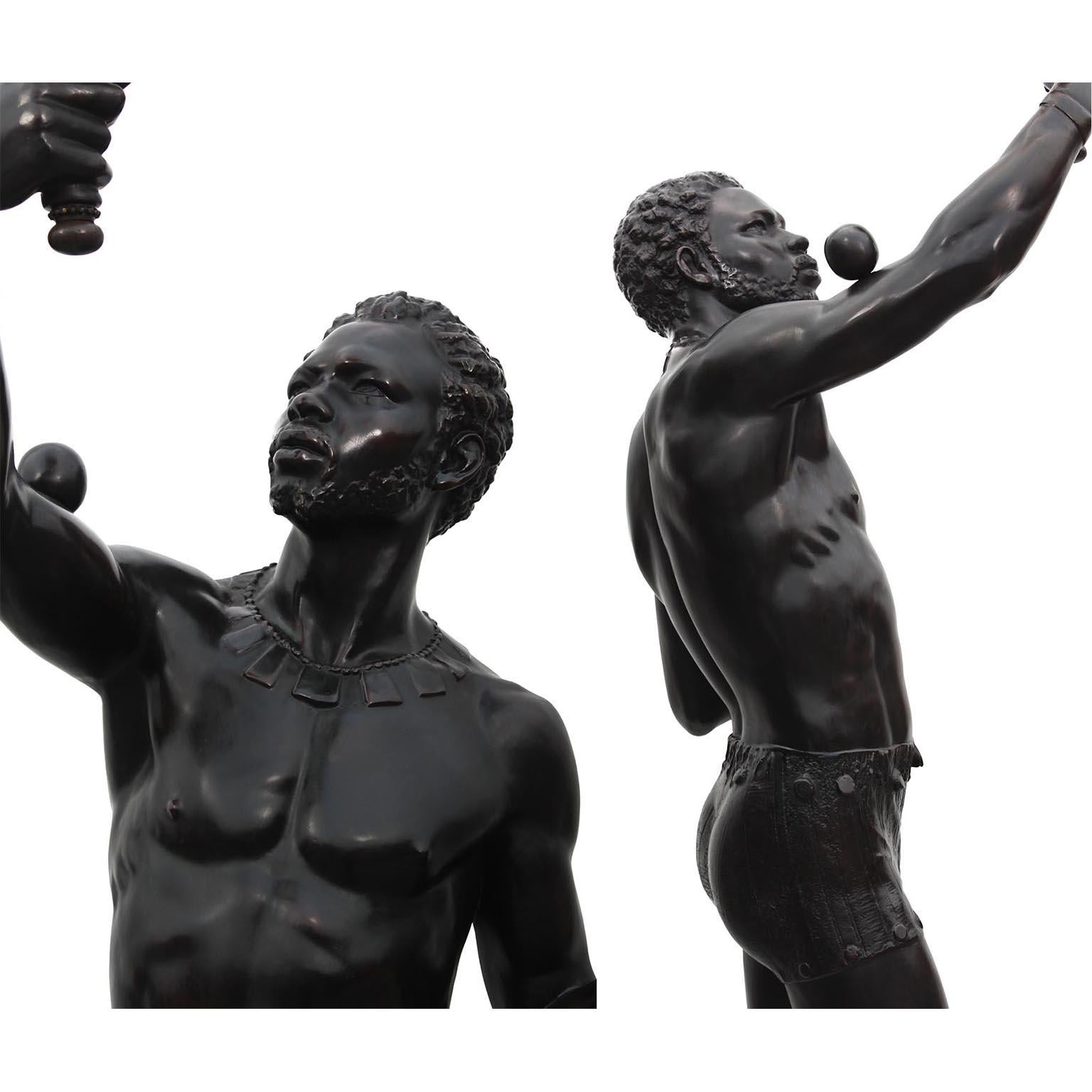 A Life-Size Pair French Cast-Iron Torchères Sculptures Juggler & Serpent Charmer For Sale 10