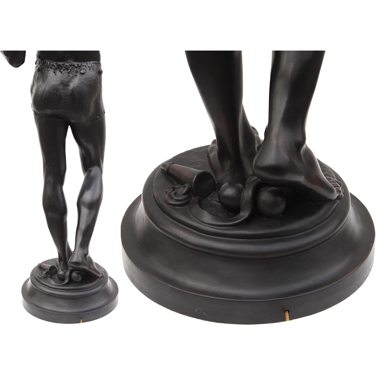 A Life-Size Pair French Cast-Iron Torchères Sculptures Juggler & Serpent Charmer For Sale 13