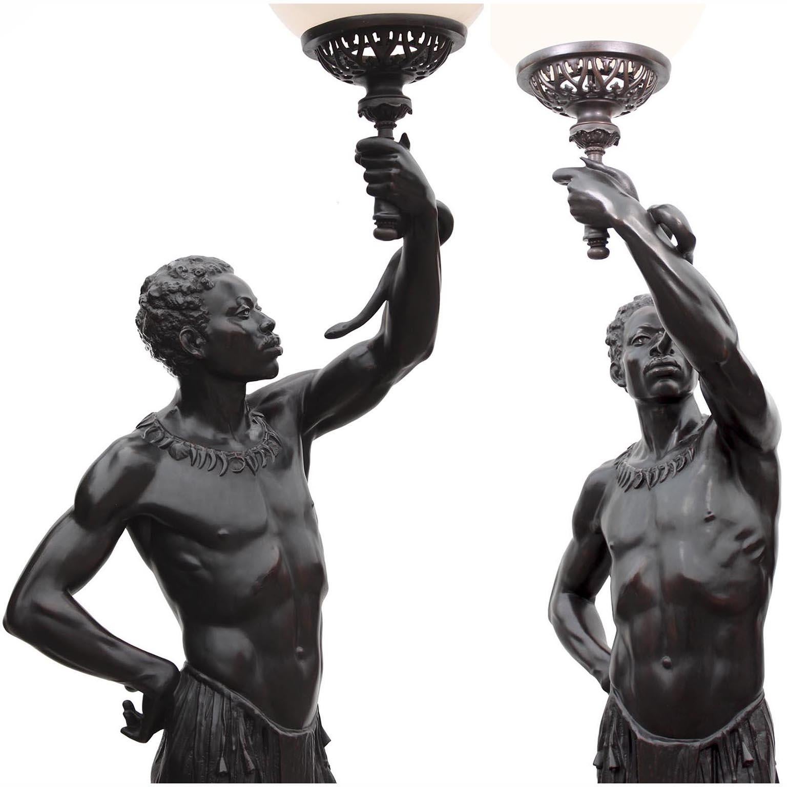 A Life-Size Pair French Cast-Iron Torchères Sculptures Juggler & Serpent Charmer In Good Condition For Sale In Los Angeles, CA