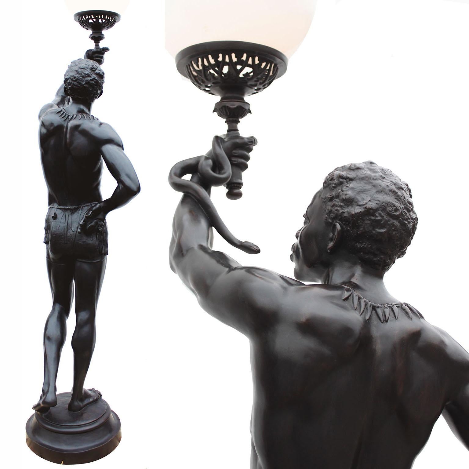 A Life-Size Pair French Cast-Iron Torchères Sculptures Juggler & Serpent Charmer For Sale 1