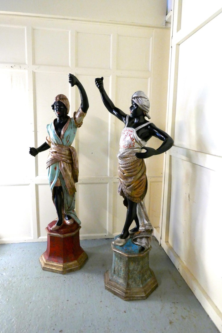 Life Size Pair of Italian Carved Wooden Statues of Nubian Slaves For