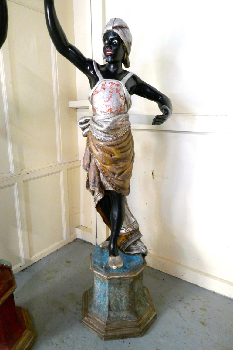 Life Size Pair of Italian Carved Wooden Statues of Nubian Slaves For